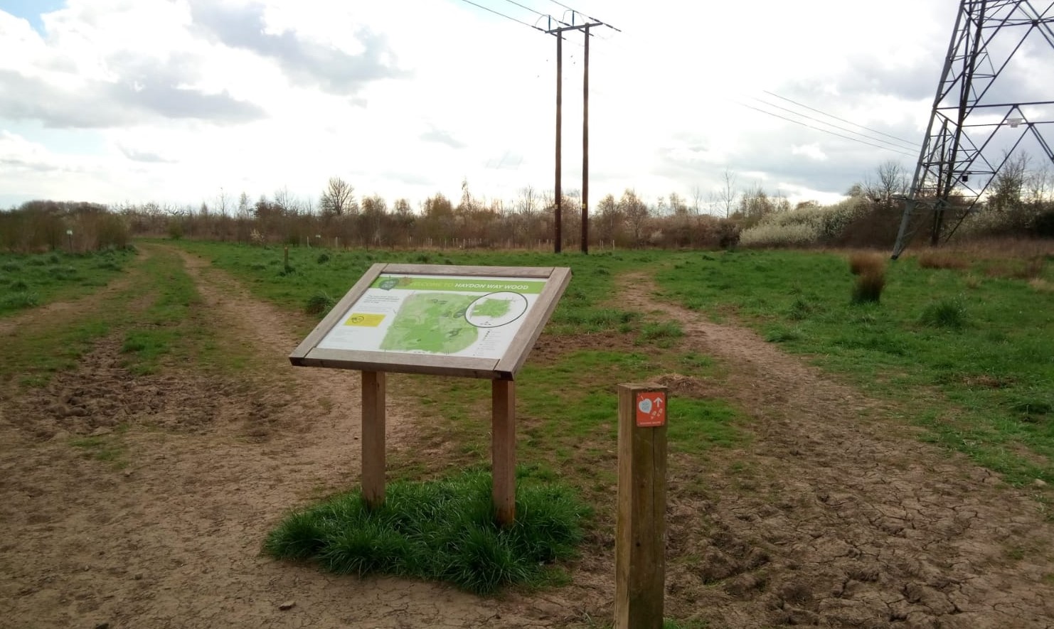 Map board and waymarker post at the beginning of Forest walk 