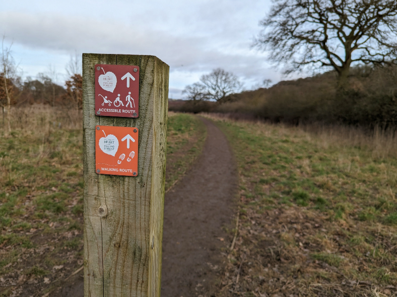 Accessible trail waymarker on post at beginning of walk