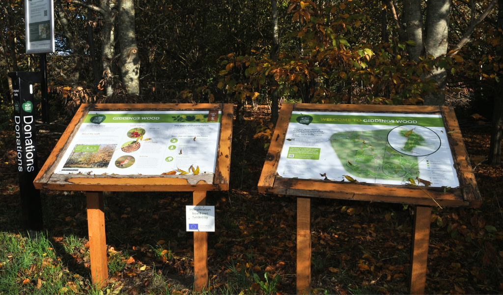 The informational boards in Giddings Wood car park