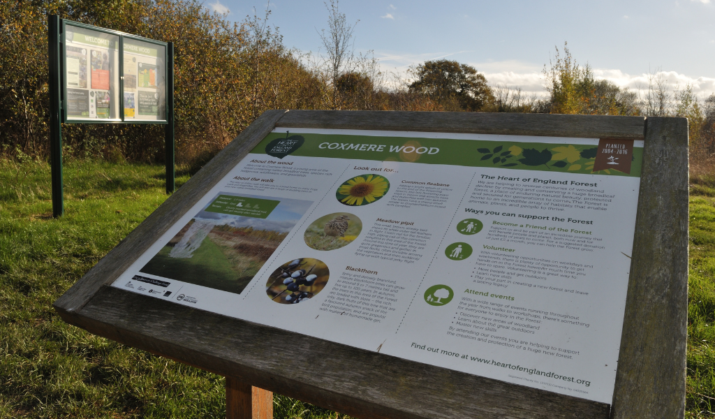 A close up of one of the welcome boards at Coxmere Wood