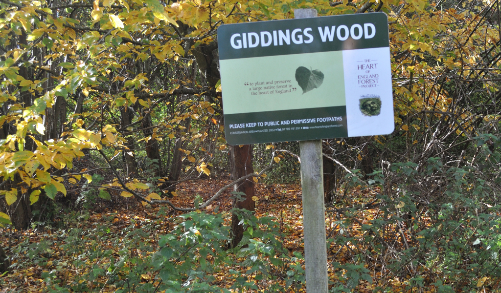 A close up of the Gidding's Wood sign