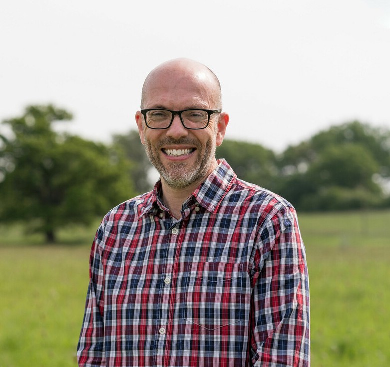 A head shot of Steve Eddy smiling at the camera 