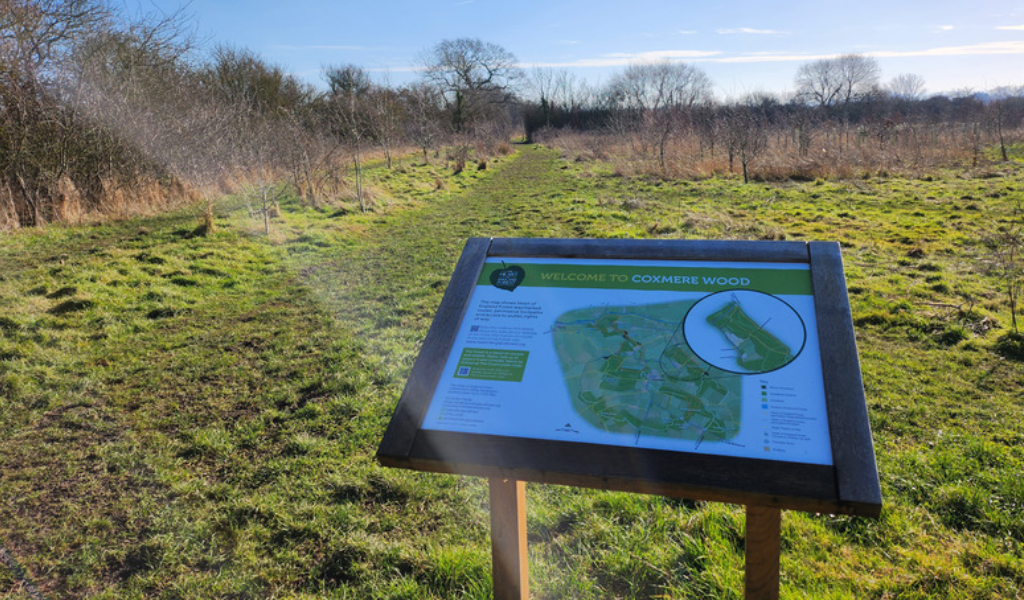 The welcome board at the car park at Coxmere Wood