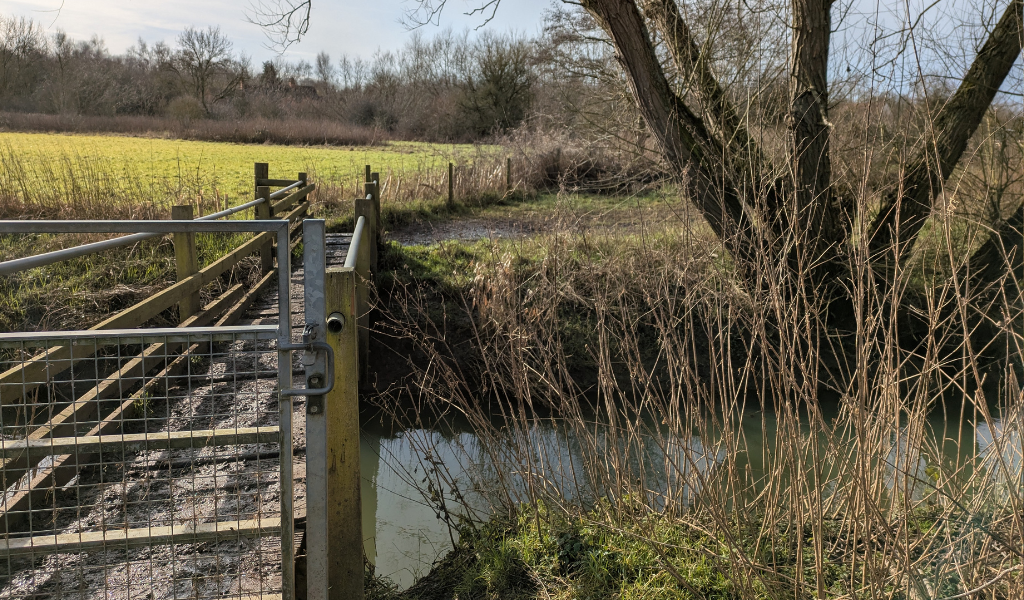 The last gate on the walk leading back to Dorothy's Wood car park, it's a bridge leading over Noleham brook