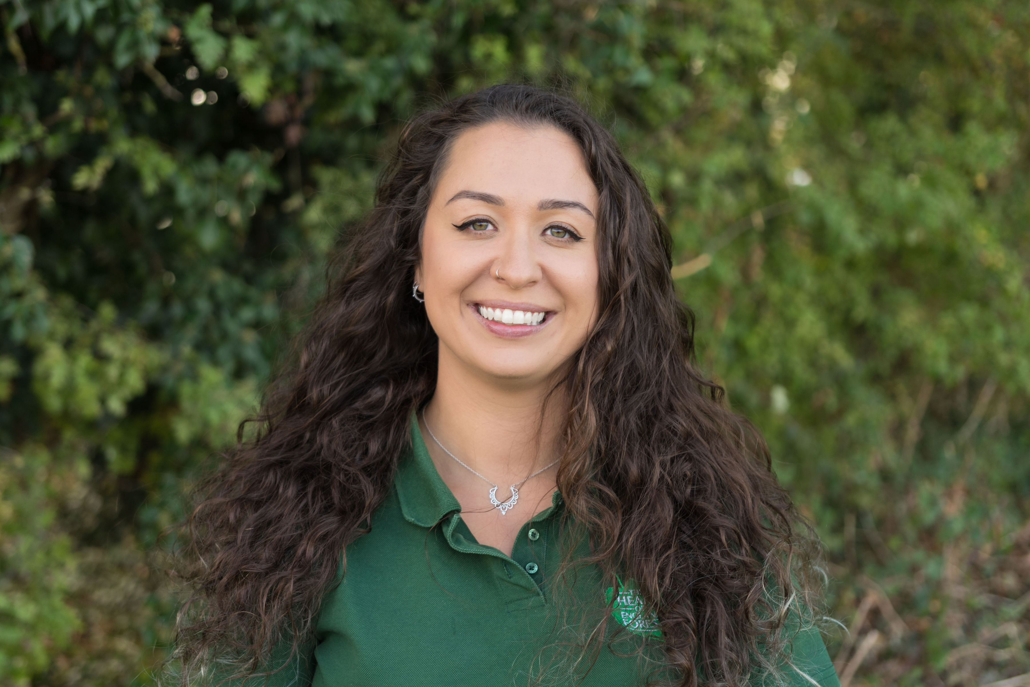 A picture of Tasha Cain smiling at the camera