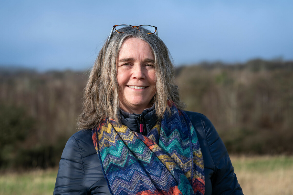 A picture of Ellie Topham smiling at the camera