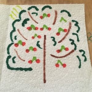 A tree crafted on a piece of kitchen roll