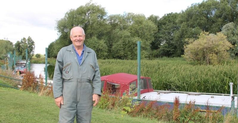 Mark, our mooring and caravan park manager, pictured standing by our moorings at Dovecote