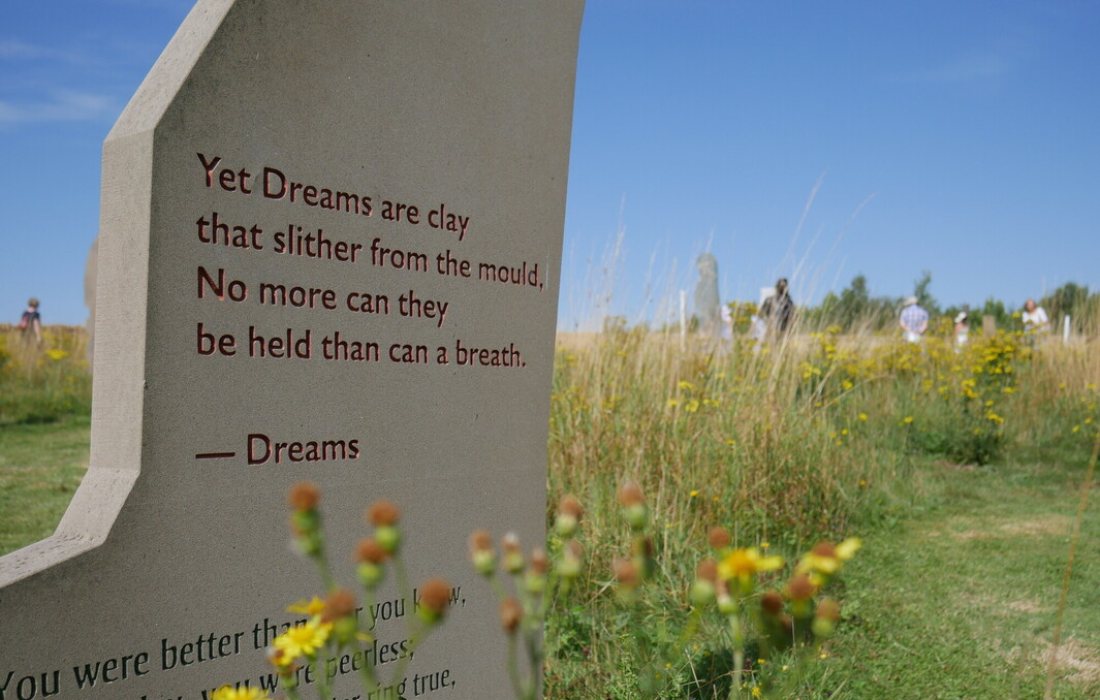 A poem: Dreams by Felix Dennis engraved onto stone in the poetry shard garden