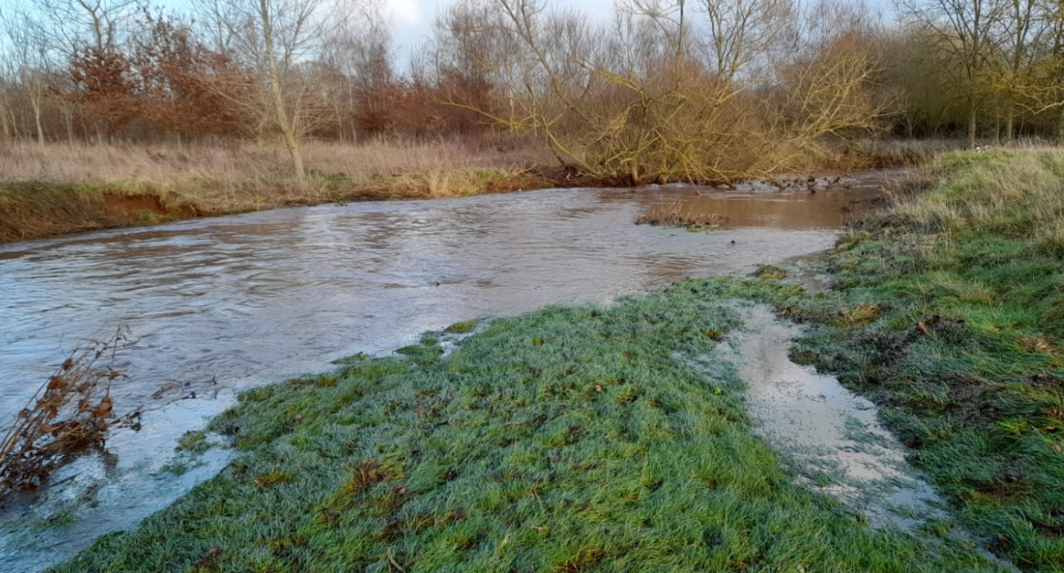 The overflowing river at Parkfield house farm.