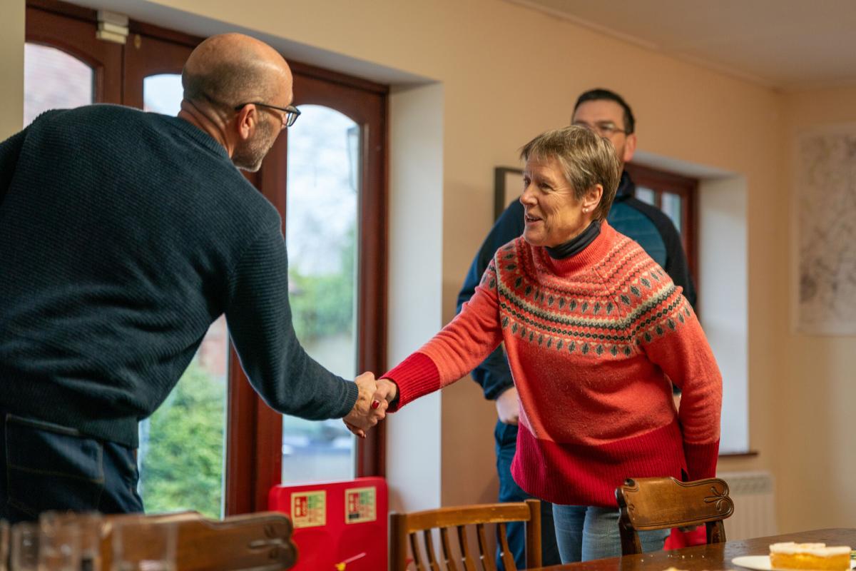 Steve Eddy and Andy Parsons shaking the hand of partner from the Common Wealth Games England