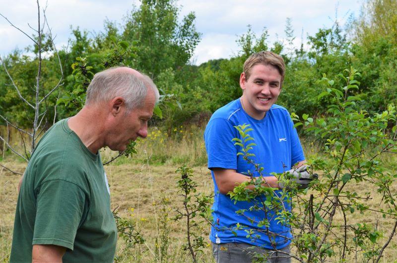 Ian, Assistant Tree Nursery Manager, working with supported intern Matt in the Forest