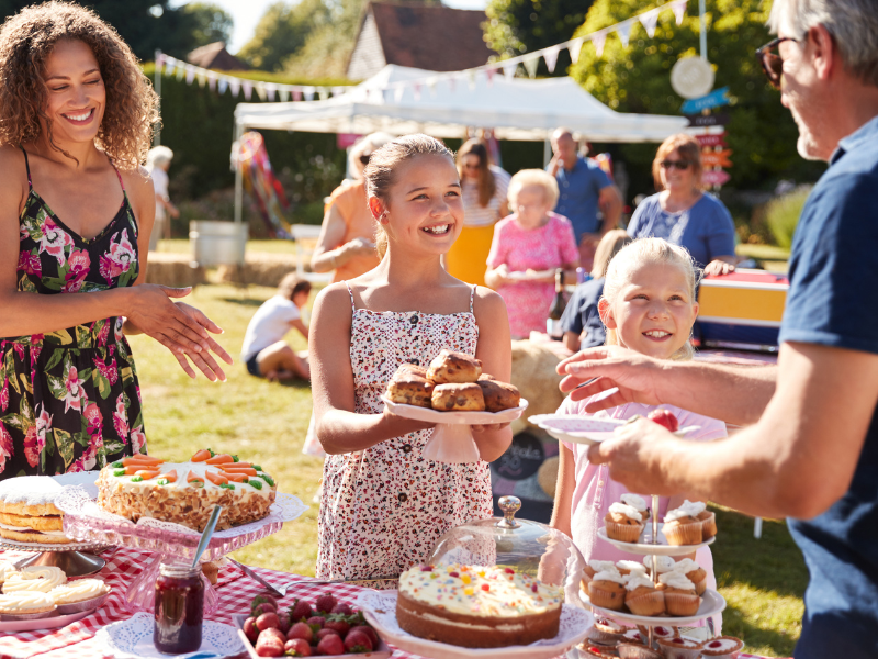 A family enjoying a tea party outdoors