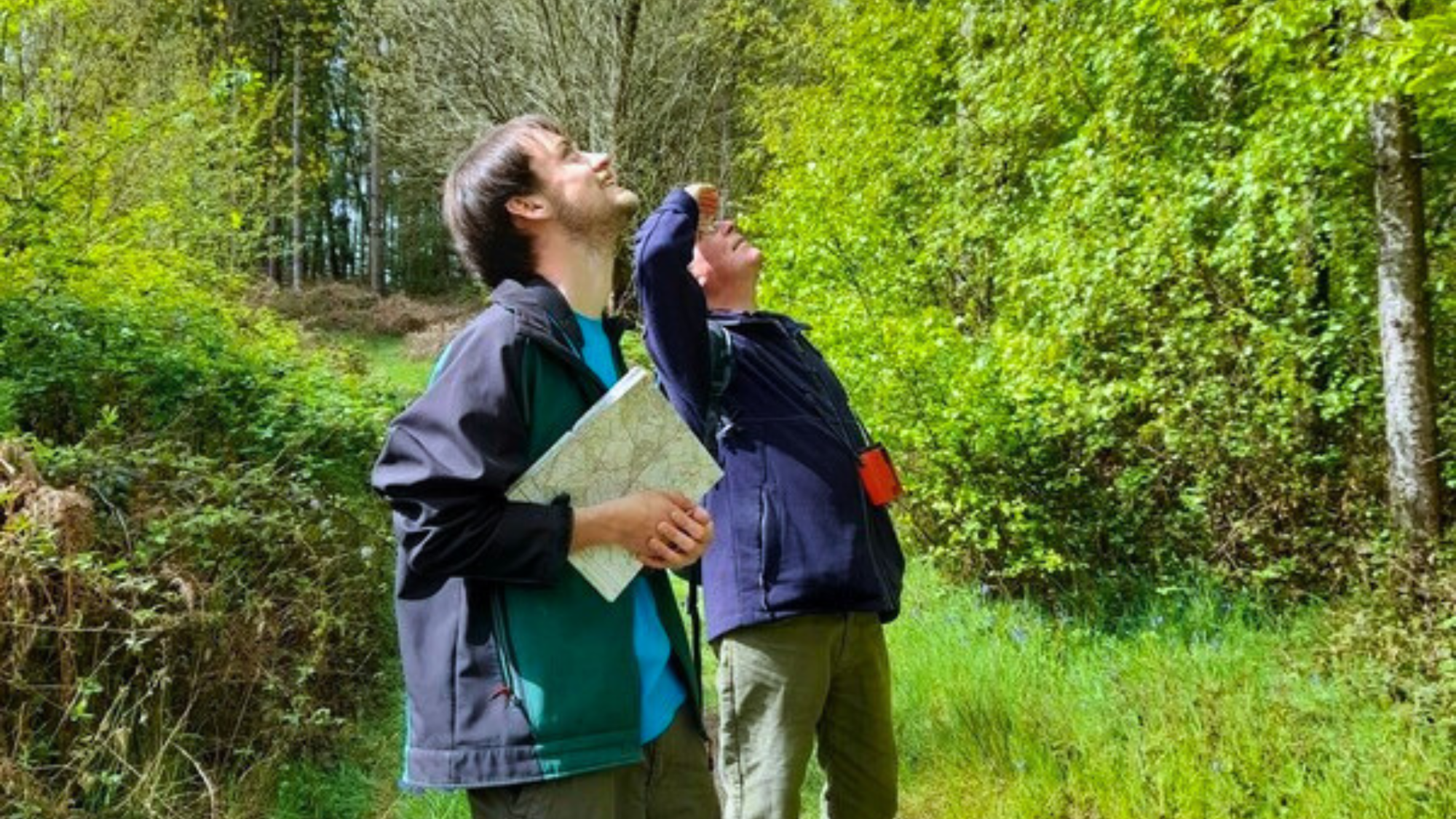 Sam and a volunteer conducting a butterfly survey for arboreal butterflies