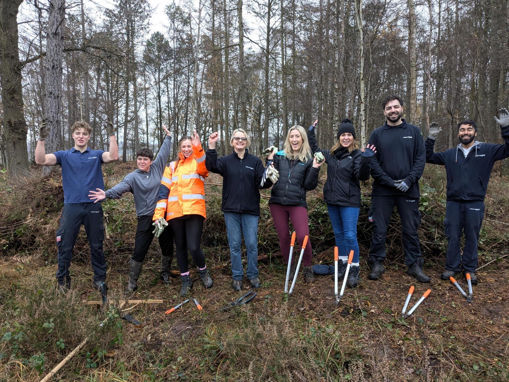A corporate group helping the clear rides at coughton park