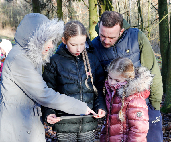 A family having fun at mini foresters