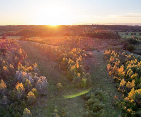 An aerial view over Middle Spernal during sunset