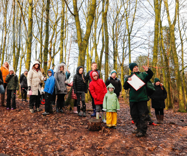 A group of mini foresters and parents having fun in the Forest