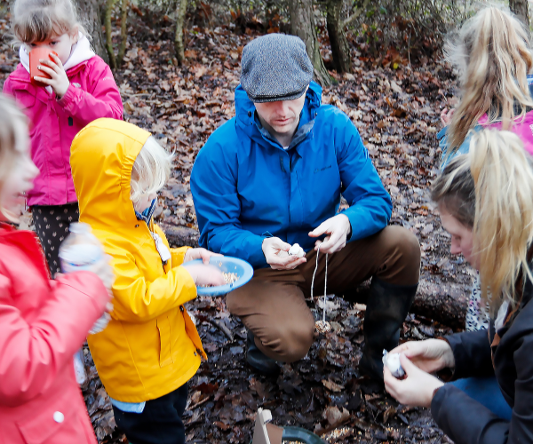 A group of mini foresters and parents having fun in the Forest