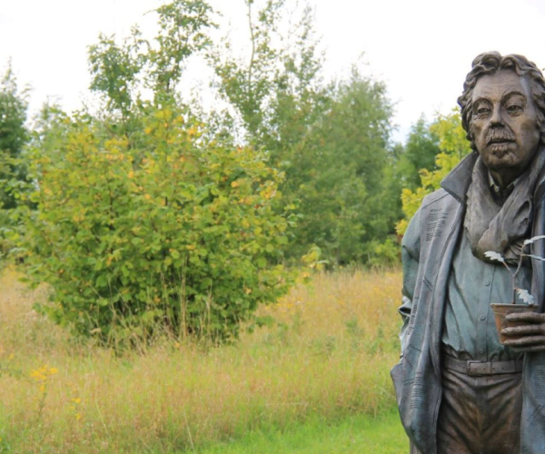 The statue of Felix Dennis along the Founder's Walk