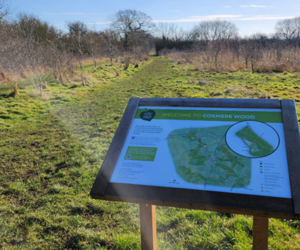 The welcome board at the car park at Coxmere Wood