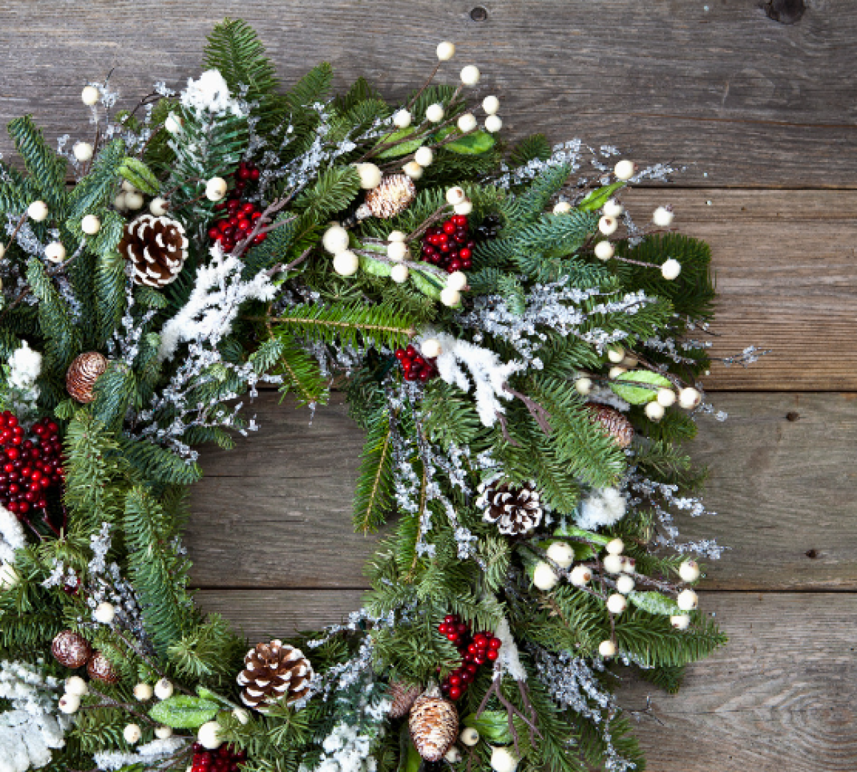 christmas wreath made with pine needles, cones and other natural materials