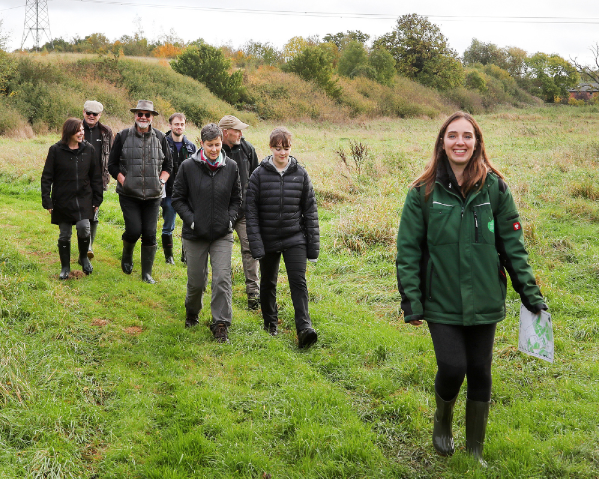 Emma leading a guided walk around Netherstead in autumntime