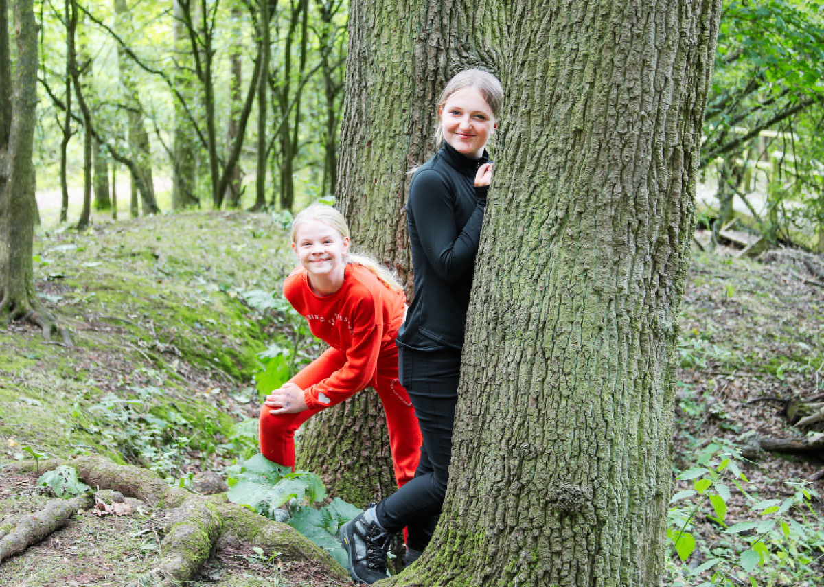 A couple of children having fun in the Forest