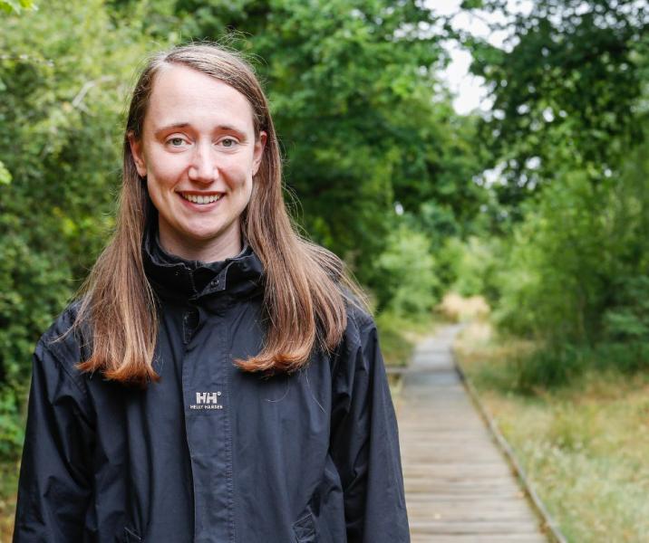 Kelsey standing on the board walk at Morgrove Coppice. 