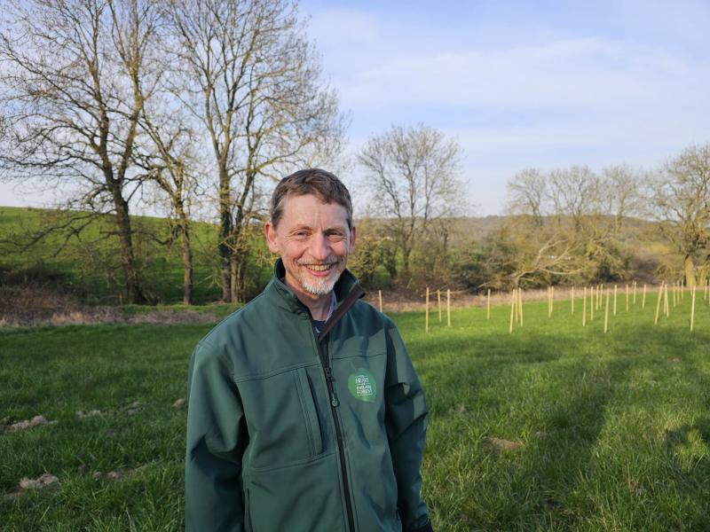Simon Pipe, Access and Trails Officer smiling looking at the camera