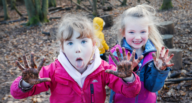 A couple of Mini Foresters showing their muddy hands at Middle Spernal