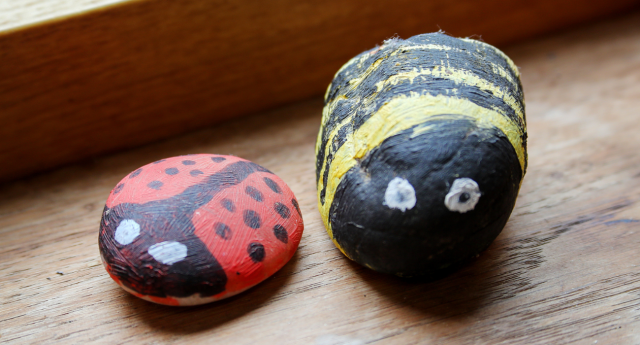 A couple of painted rocks done by children at WildTribe at Middle Spernal