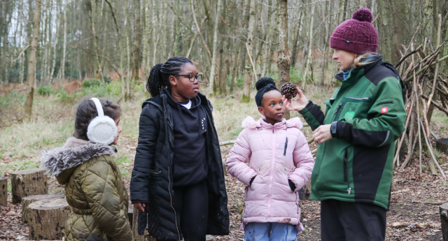 A couple of Young Foresters listening to a member of staff at Gorcott Hill