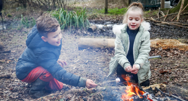 A couple of Young Foresters toasting marshmallows at Gorcott Hill